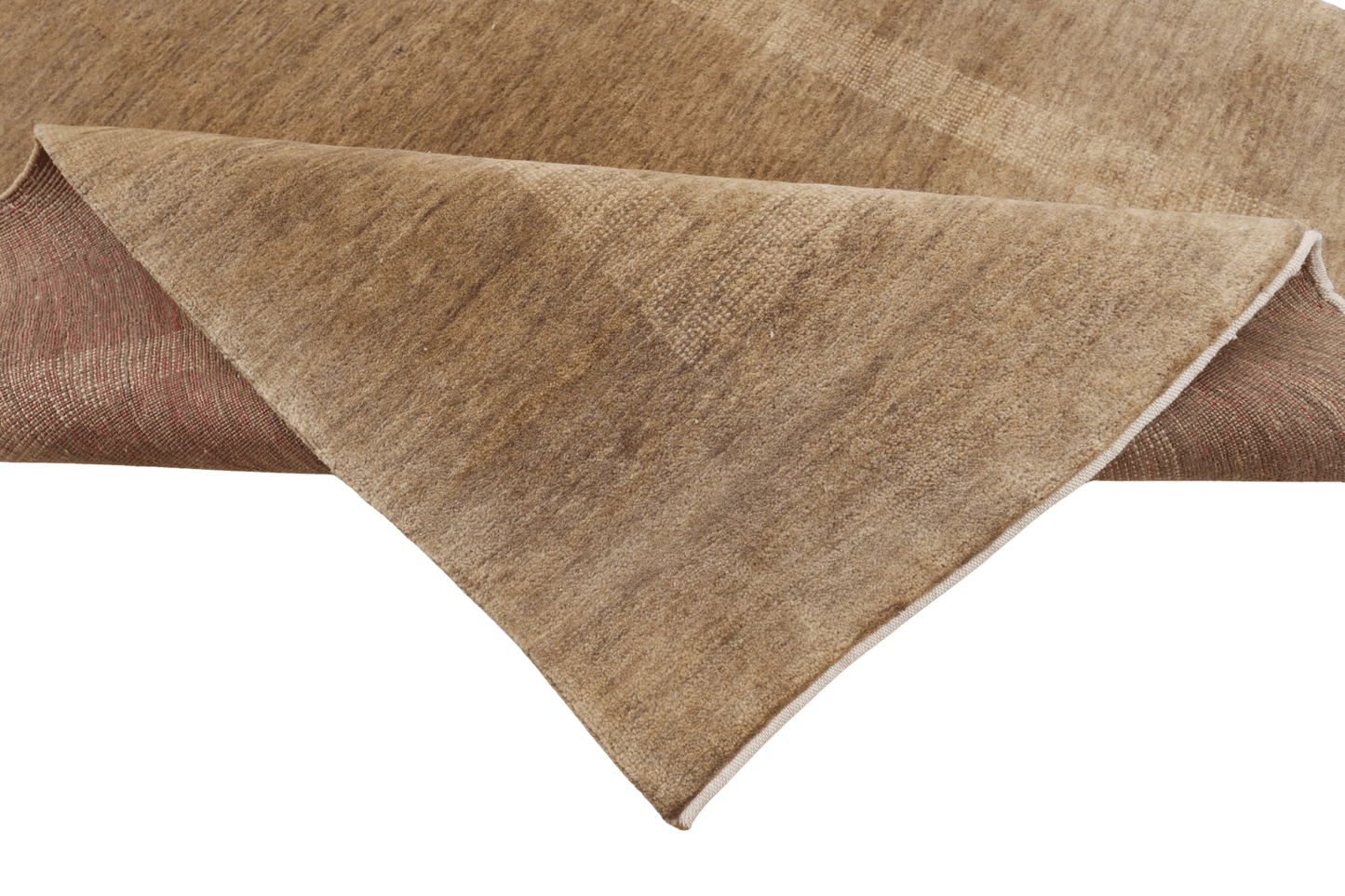 Skymning – Handknuten ullmatta i harmoniska jordtoner - Designmatta.se