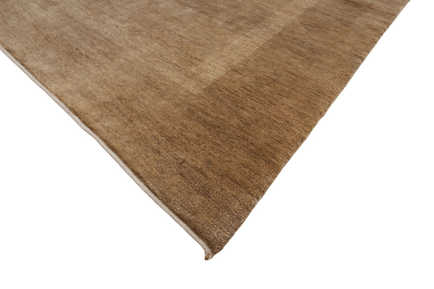 Skymning – Handknuten ullmatta i harmoniska jordtoner - Designmatta.se