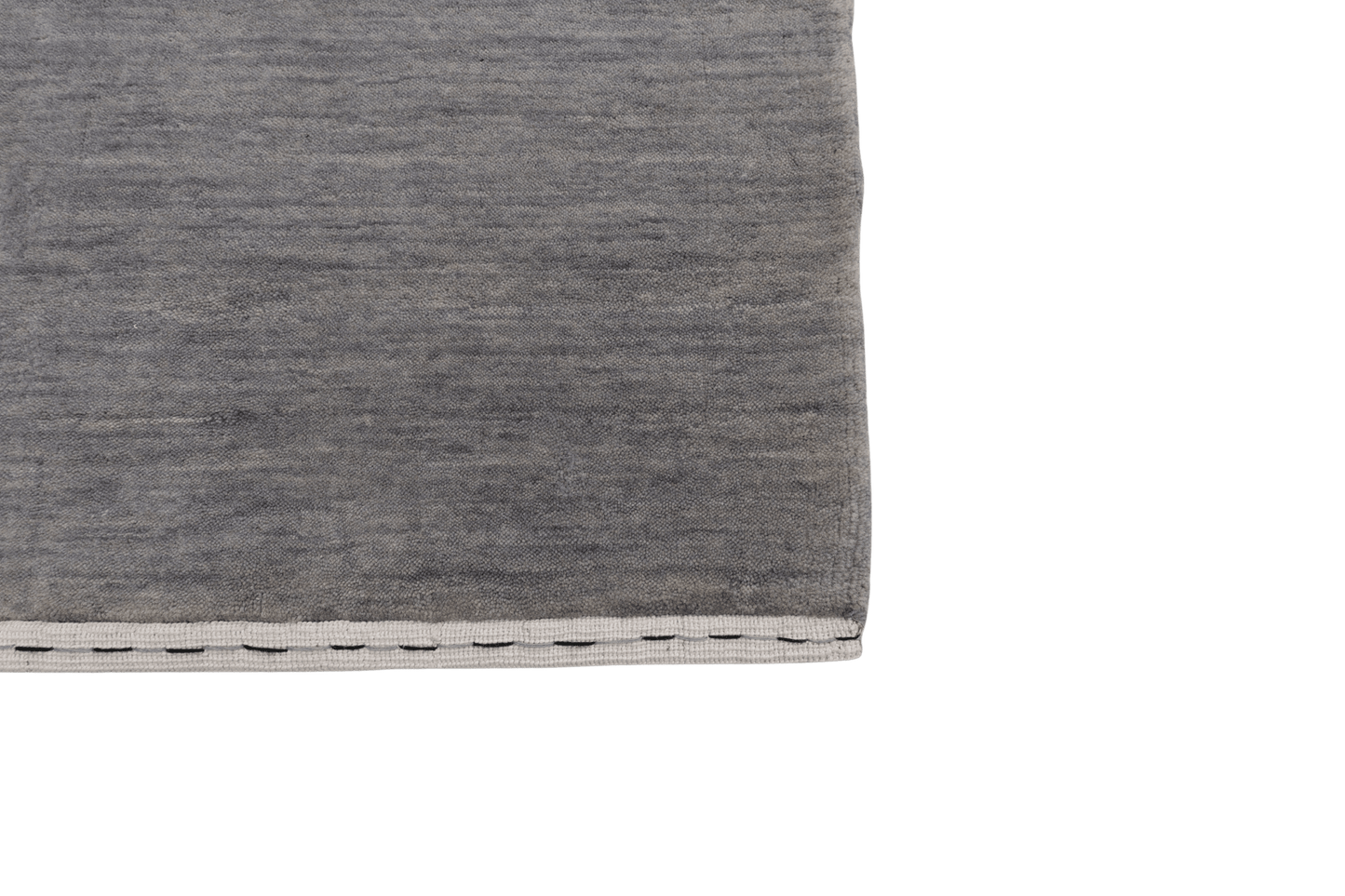 Melerad grå i tidlös enkelhet - Designmatta.se