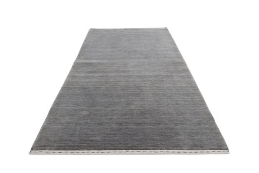 Melerad grå i tidlös enkelhet - Designmatta.se